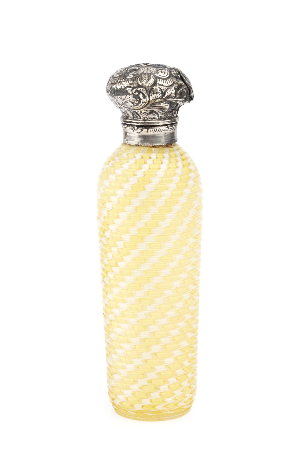 A late 19th century silver topped ridged glass scent bottle, with yellow and white spiral lattice