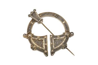 A mid Victorian Irish Tara brooch, by Waterhouse & Co, Dublin, decorated in relief with Celtic