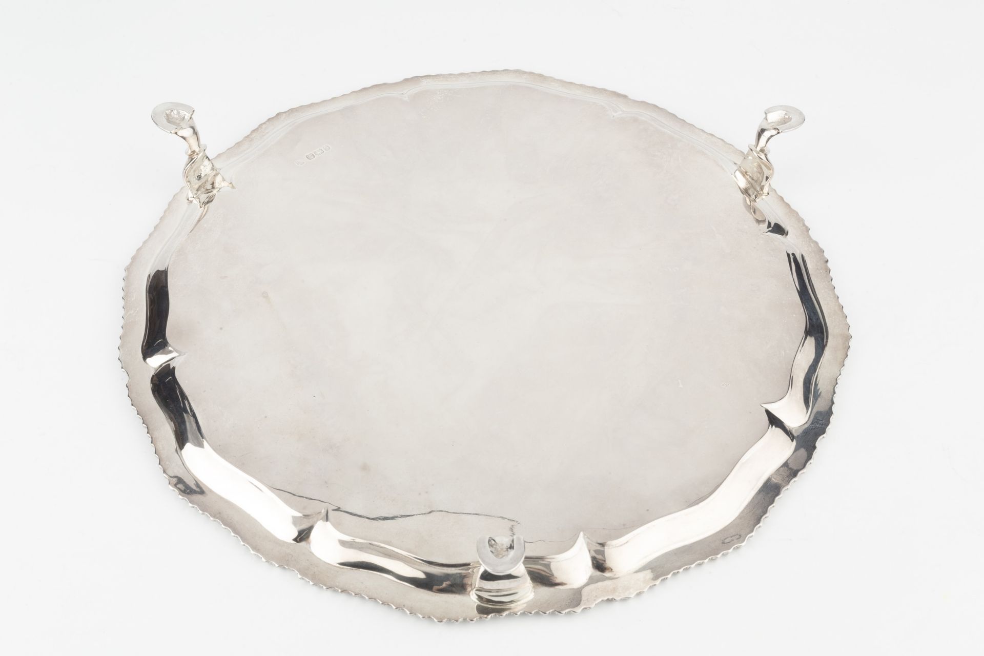 A late Victorian silver salver, with shaped and gadrooned border, on pad feet, later presentation - Image 2 of 2