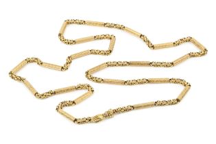 A 19th century yellow precious metal long chain, composed of alternating foliate engraved