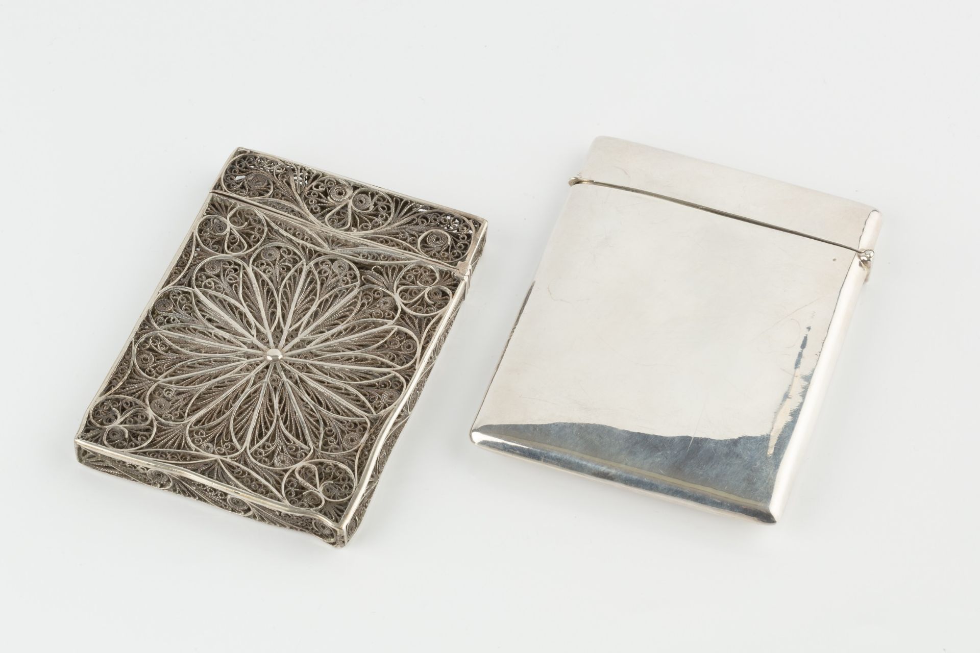 An early 20th century American silver card case, of slightly bowed rectangular form, embossed to the - Image 2 of 2