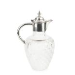 A late Victorian silver mounted cut glass claret jug, with hinged cover, plain curved handle and