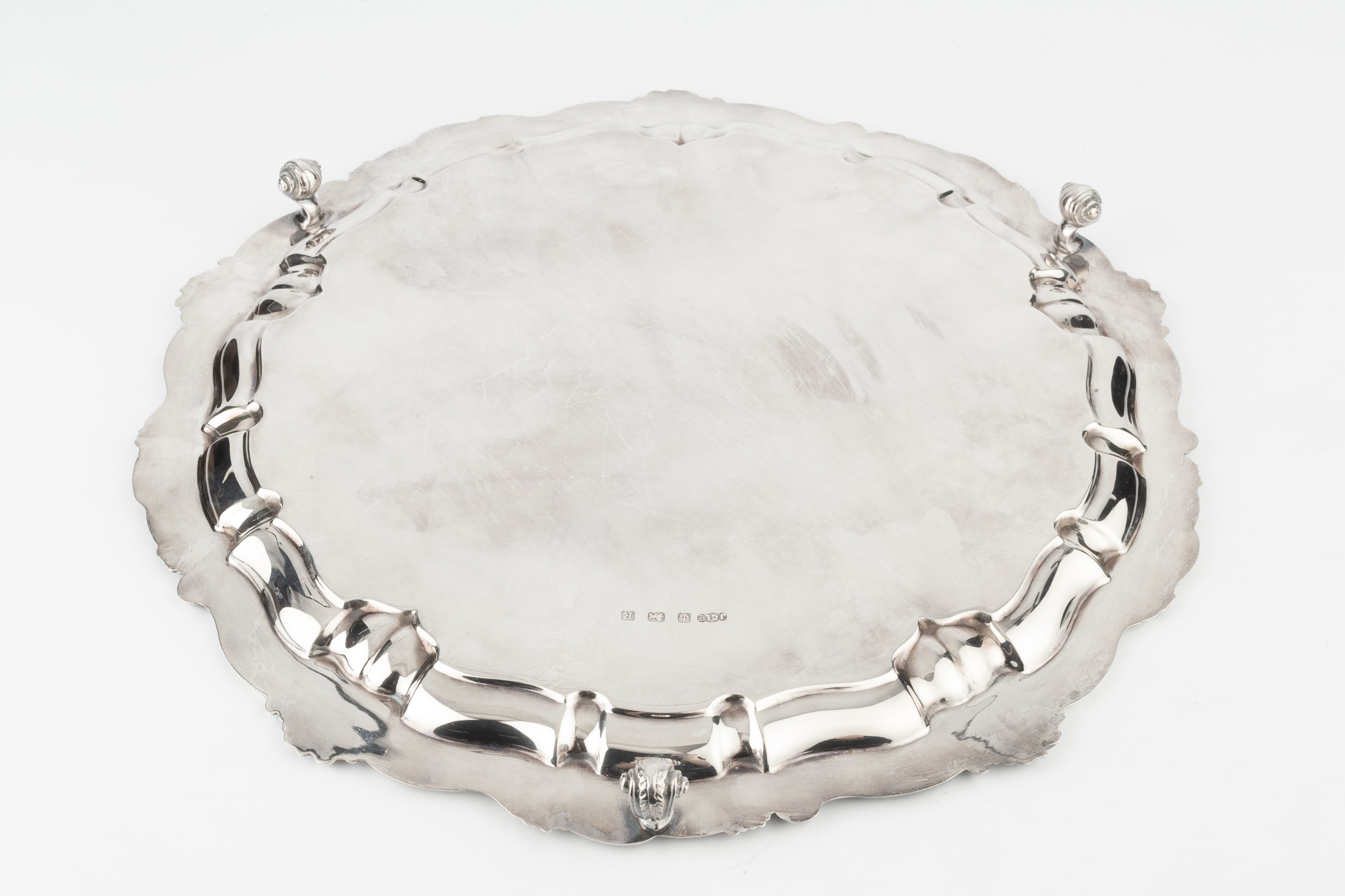 A George VI silver salver, with shaped foliate scroll cast border, on scroll feet by Joseph - Image 2 of 2