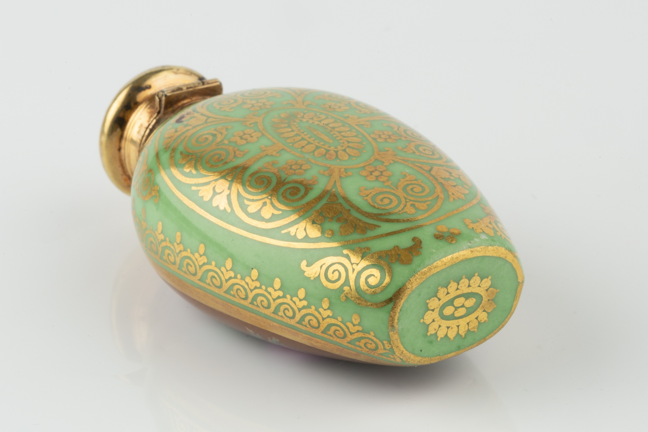 A late 19th century French porcelain scent bottle, of ovoid form, painted with an oval panel of a - Image 2 of 3