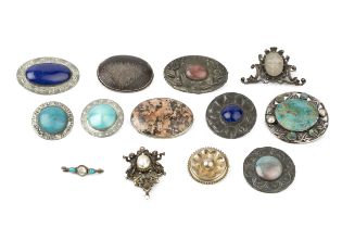 A collection of Arts and Crafts style brooches, to include a circular brooch with turquoise