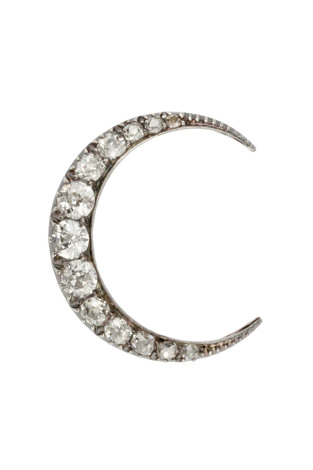 A diamond crescent brooch, set with thirteen graduated brilliant cut stones, the largest approx 0.