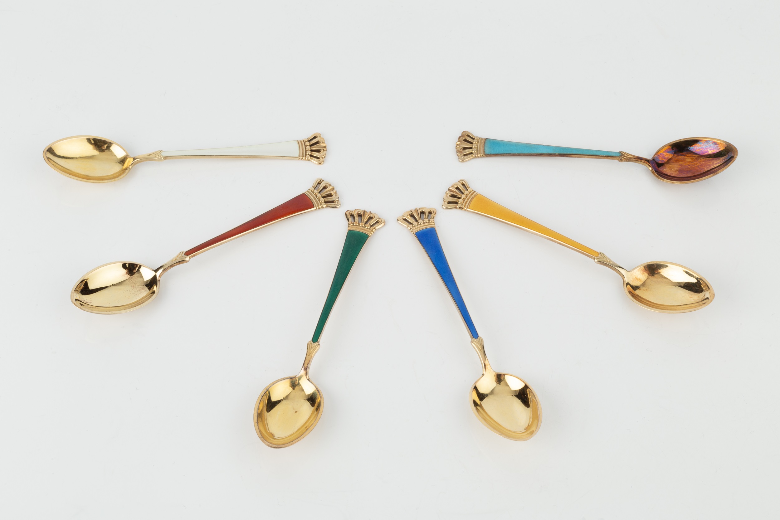 Two sets of six Danish silver-gilt and enamel coffee spoons, with vari-coloured enamel handles and - Image 2 of 2