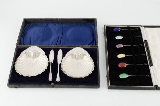 A collection of silver, comprising an Arts & Crafts style pepper by Liberty & Co, Birmingham 1913,