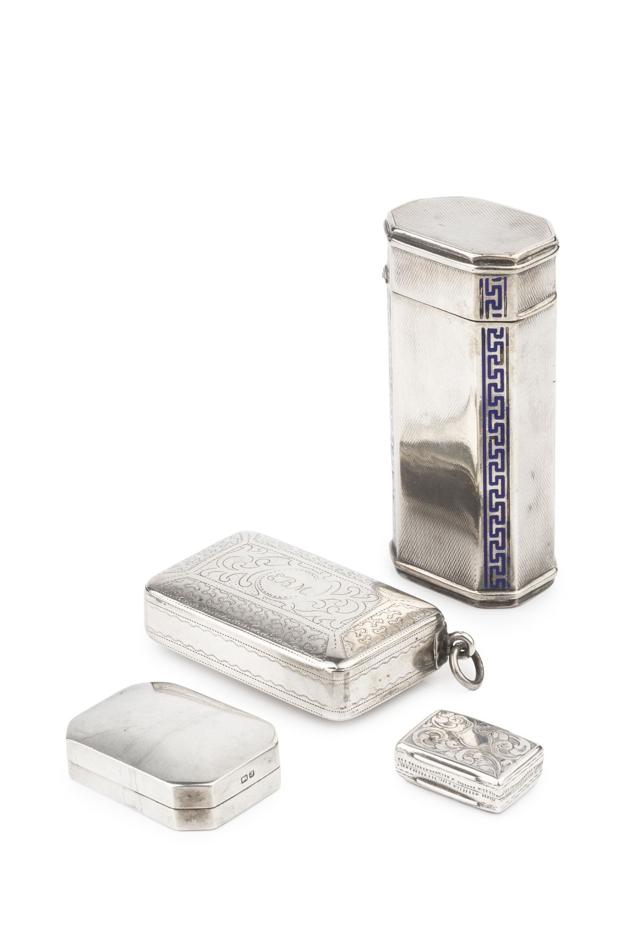 An early Victorian silver rectangular vinaigrette, with engraved decoration, and pierced hinged