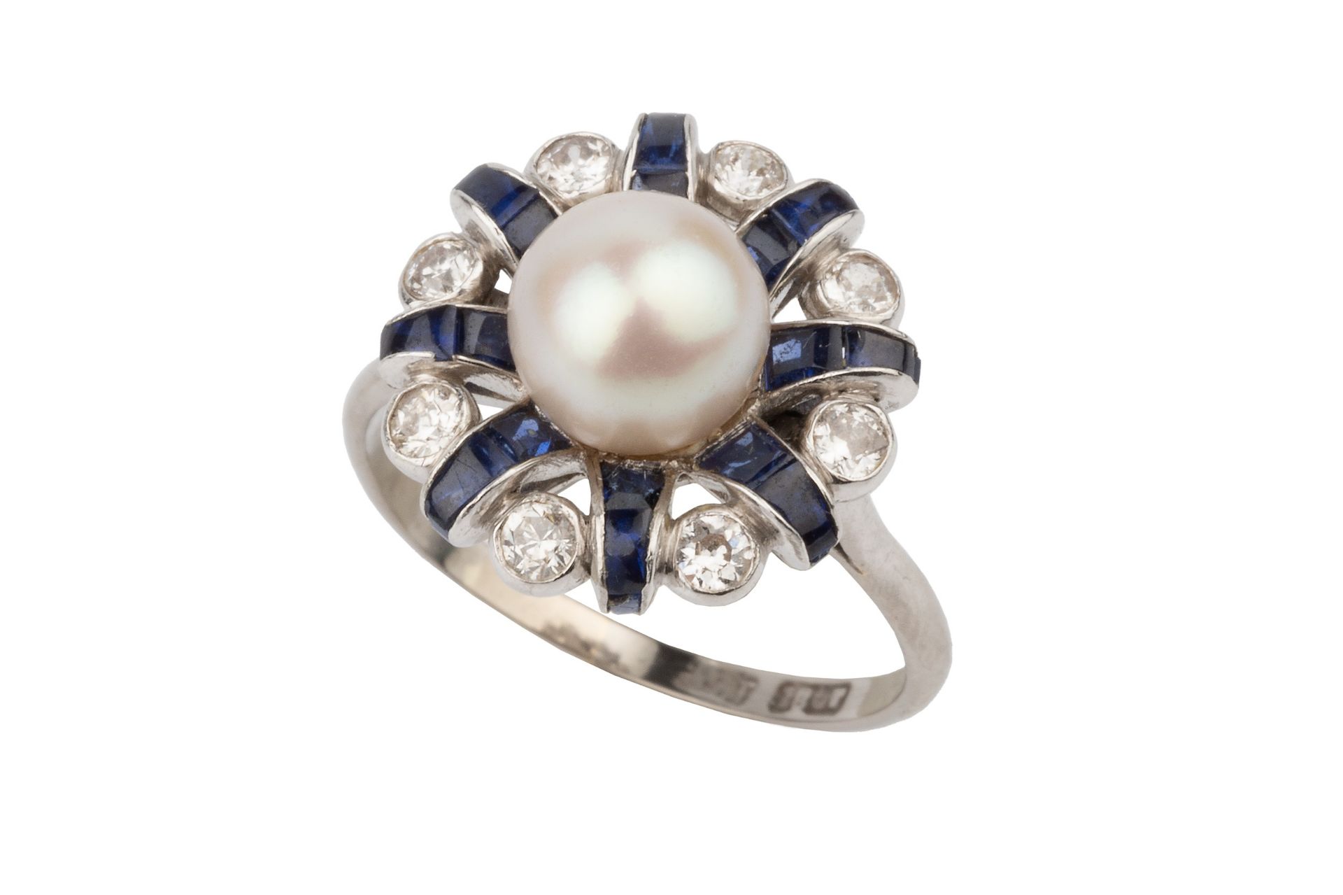 A diamond, sapphire and cultured pearl dress ring, the central pearl (untested) set within a