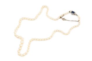 A single strand cultured pearl necklace, having sapphire and diamond set clasp centred with a