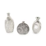 A modern silver scent bottle, of moon flask form, relief decorated with tulips and foliage by Ari D.