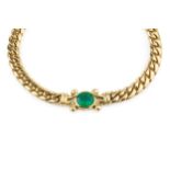 An 18ct gold and emerald necklace by Theo Fennell, of curb link design, with central oval collet-set