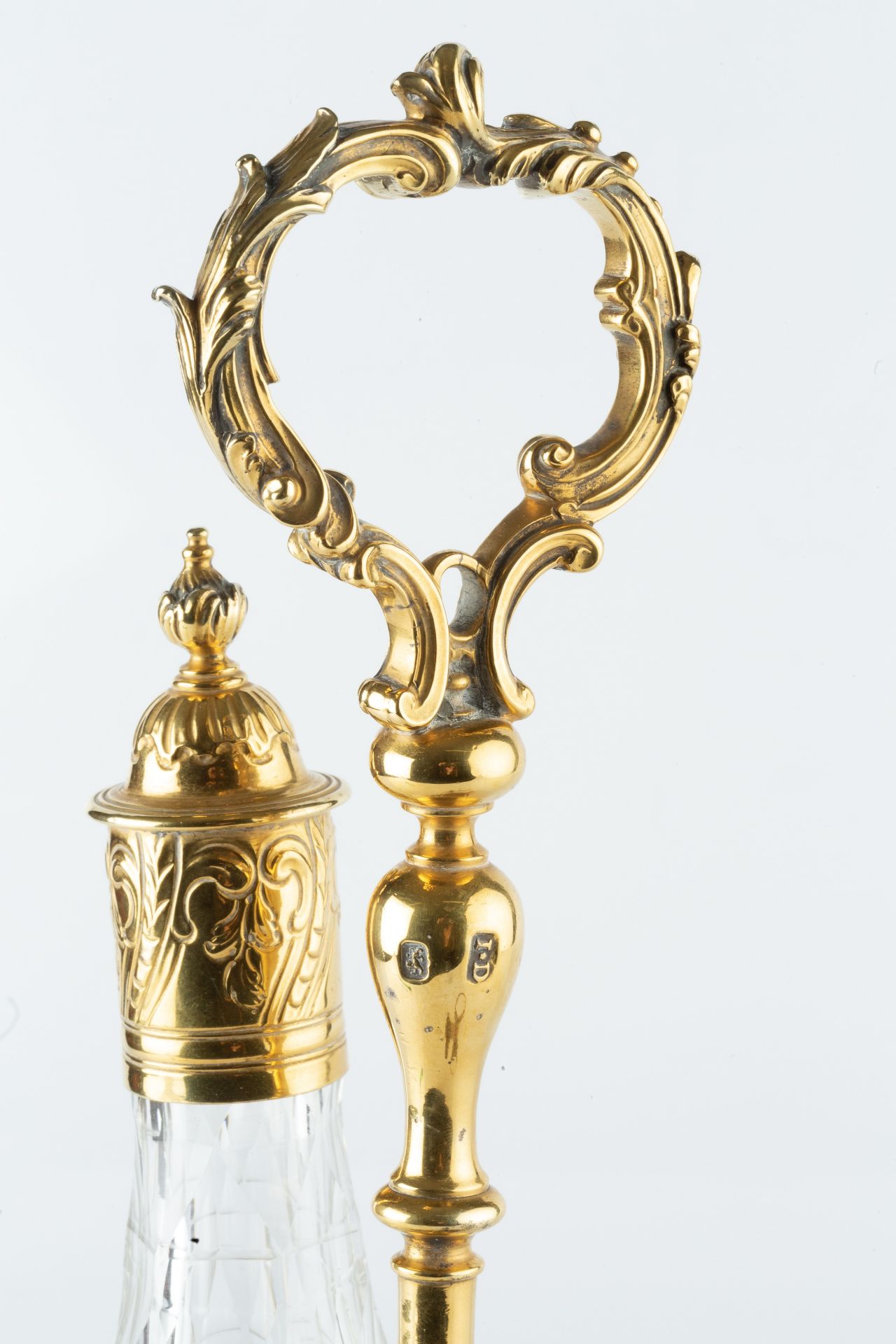 A George III silver-gilt cruet stand, the central foliate loop handle flanked by two gadrooned - Bild 2 aus 2