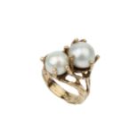 A pearl crossover dress ring, the yellow precious metal mount of textured seaweed form (pearls