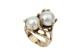 A pearl crossover dress ring, the yellow precious metal mount of textured seaweed form (pearls