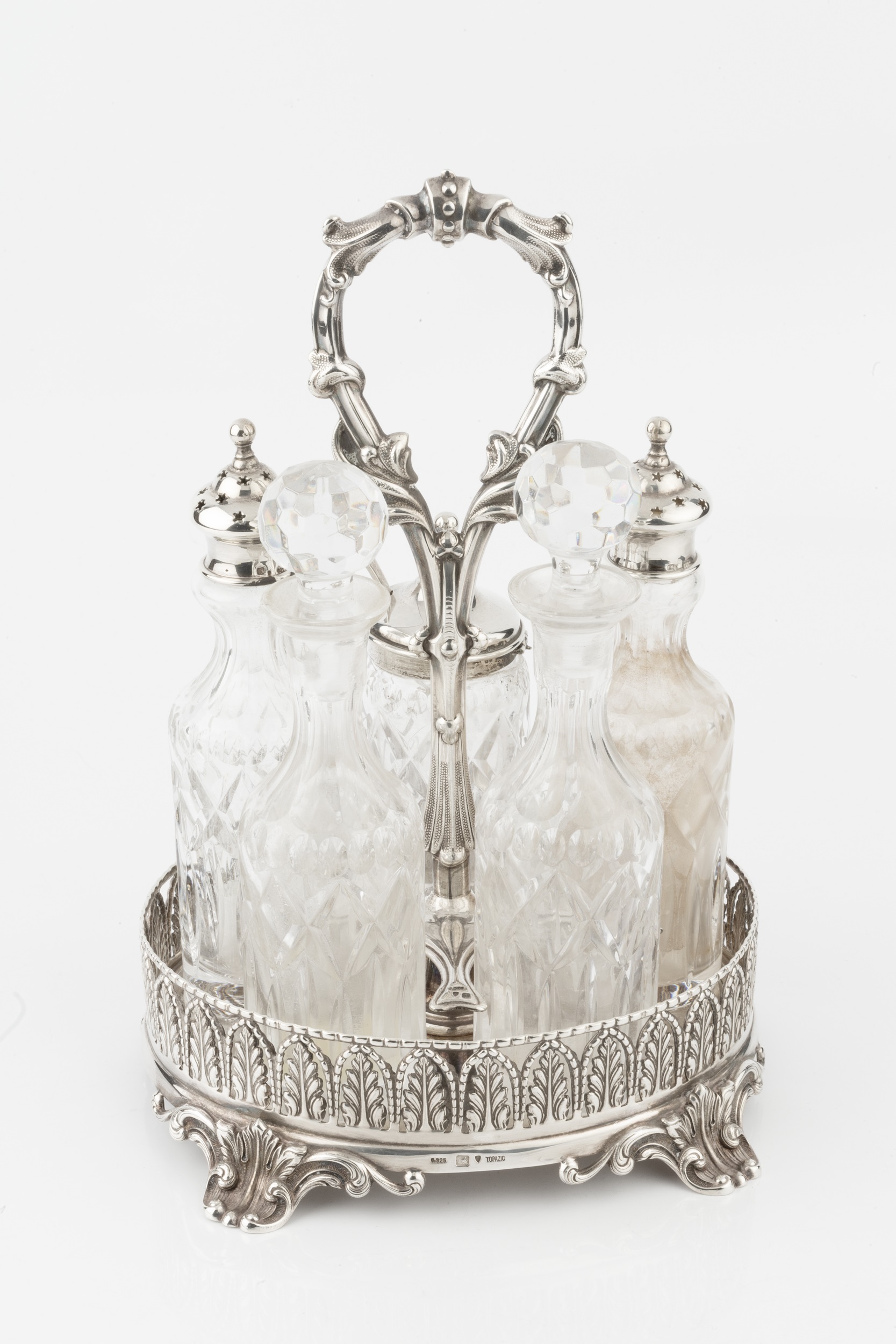 A Portuguese silver oval cruet stand, the pierced gallery with repeated stylised leaf and arch - Image 2 of 3