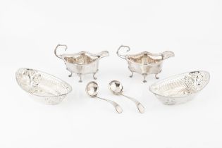 A pair of late Victorian silver oval sweetmeat baskets, pierced and repoussé decorated with