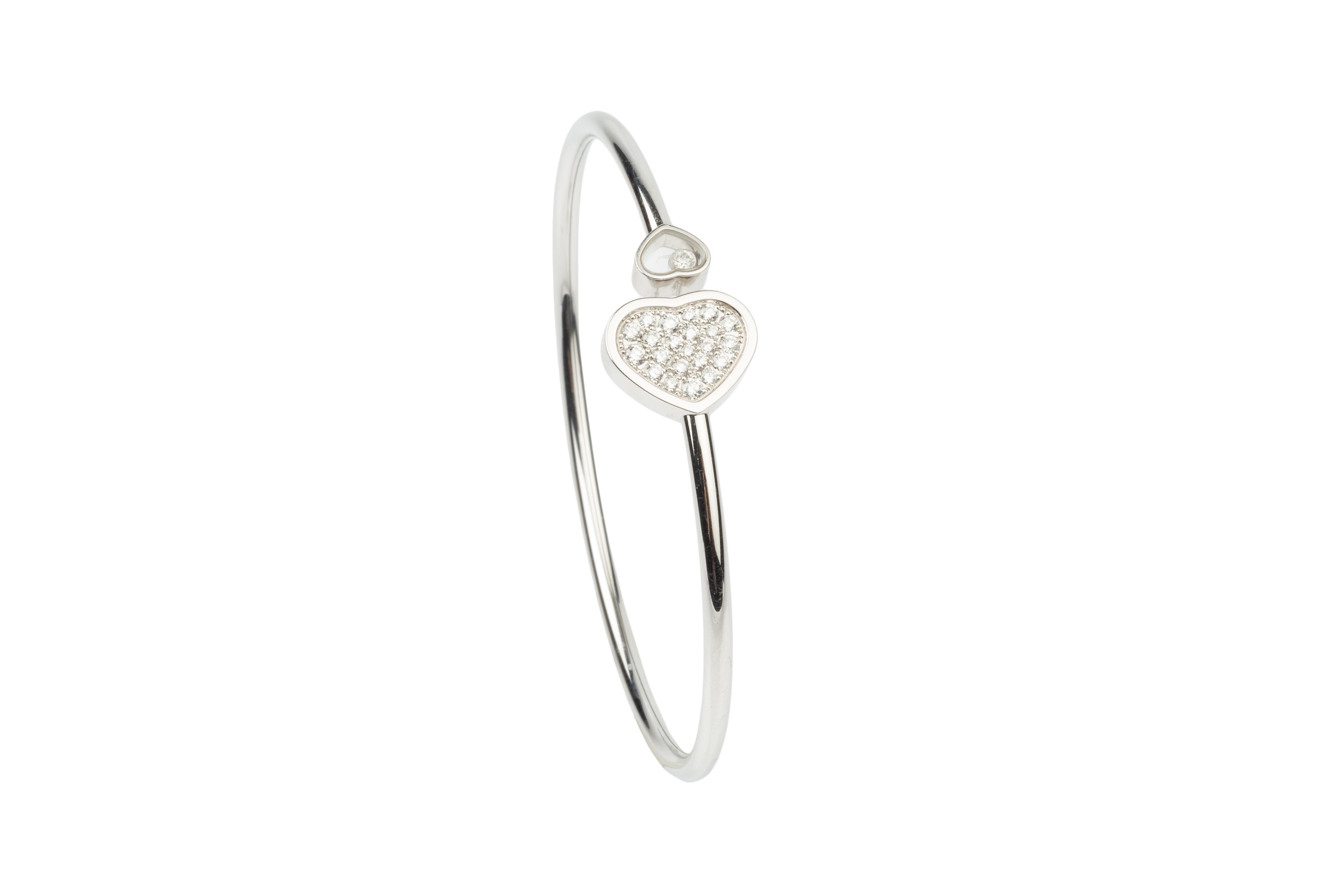 An 18ct white gold and diamond 'Happy Hearts' bangle by Chopard, the main heart terminal set with - Image 2 of 5