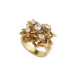 An 18ct yellow gold and diamond dress ring, of angular raised openwork design, claw set with five