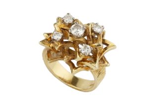 An 18ct yellow gold and diamond dress ring, of angular raised openwork design, claw set with five
