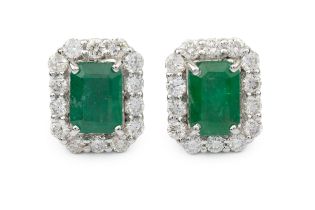A pair of emerald and diamond ear studs, of chamfered rectangular design, each set with a step cut