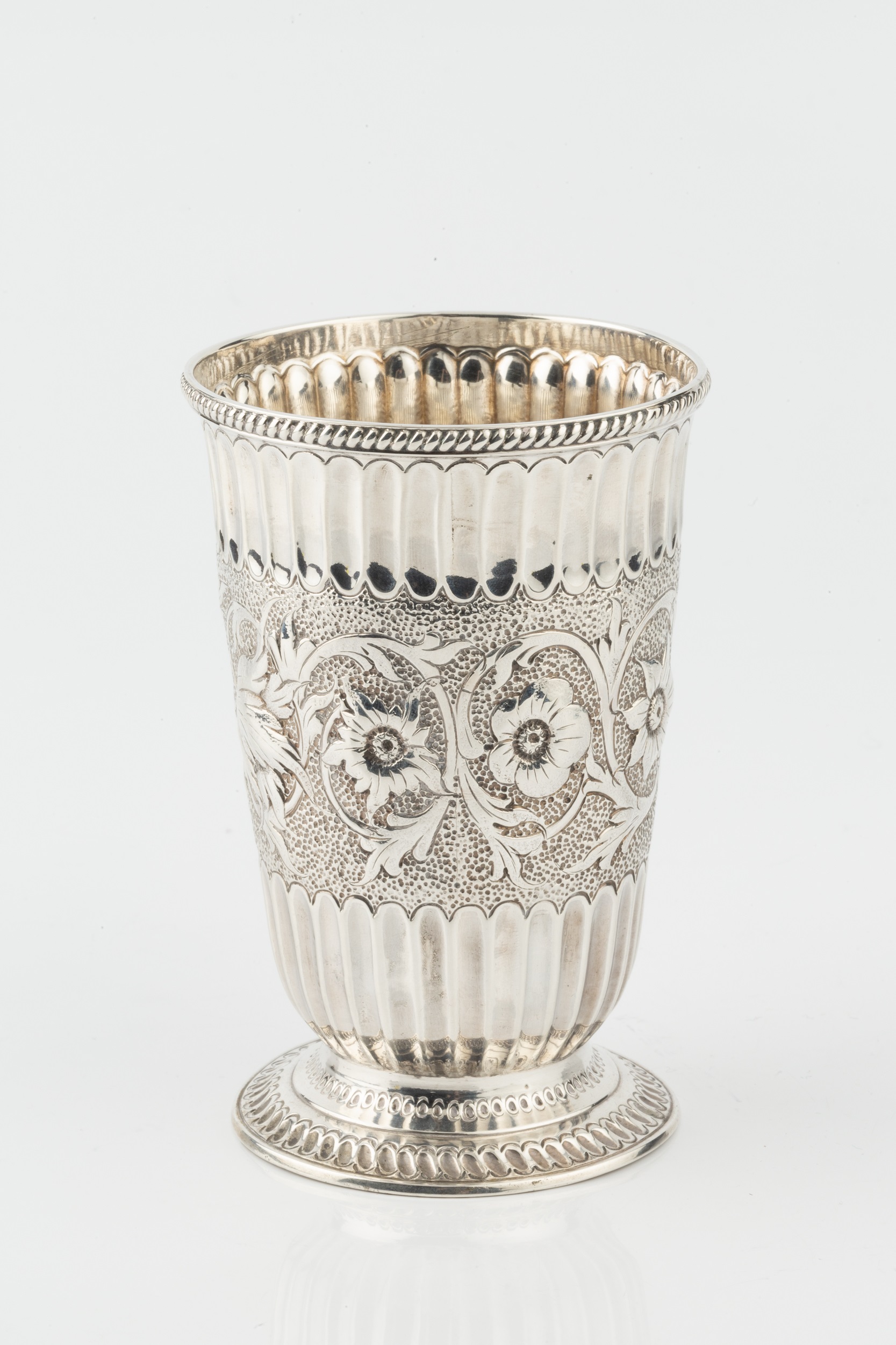 A mid Victorian silver beaker, the slightly tapered and flared body chased and engraved with a - Image 4 of 4