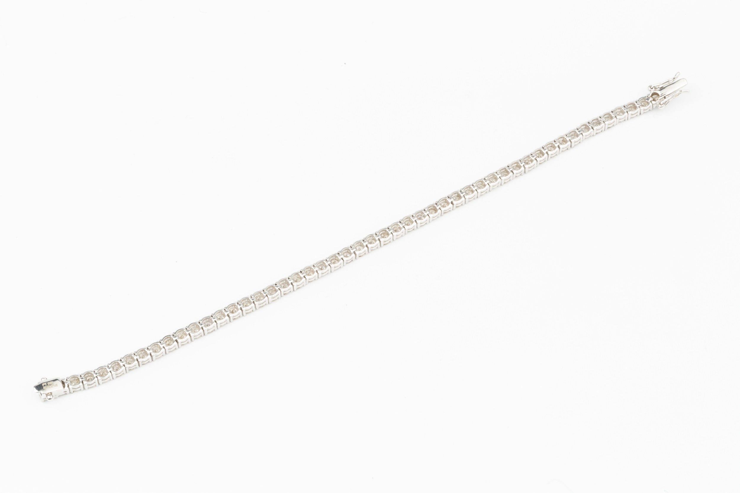 A diamond line bracelet, set in platinum with fifty round brilliant cut stones, with WGI report - Image 2 of 3