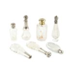 A 19th century French silver mounted glass scent bottle, of shaped and faceted teardrop form, with