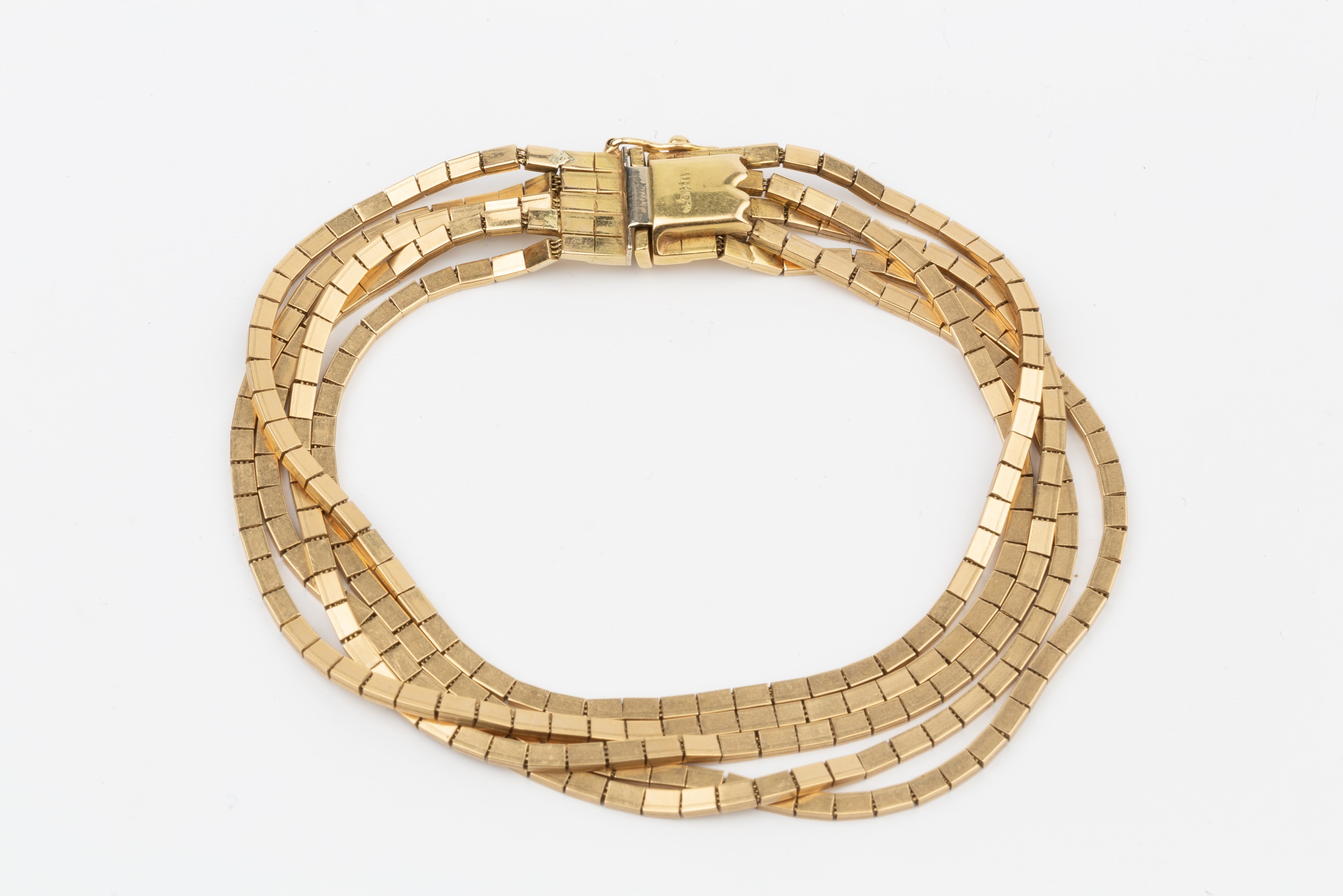 An 18ct gold five strand bracelet, composed of flexible flattened rectangular links, the clasp - Image 2 of 3