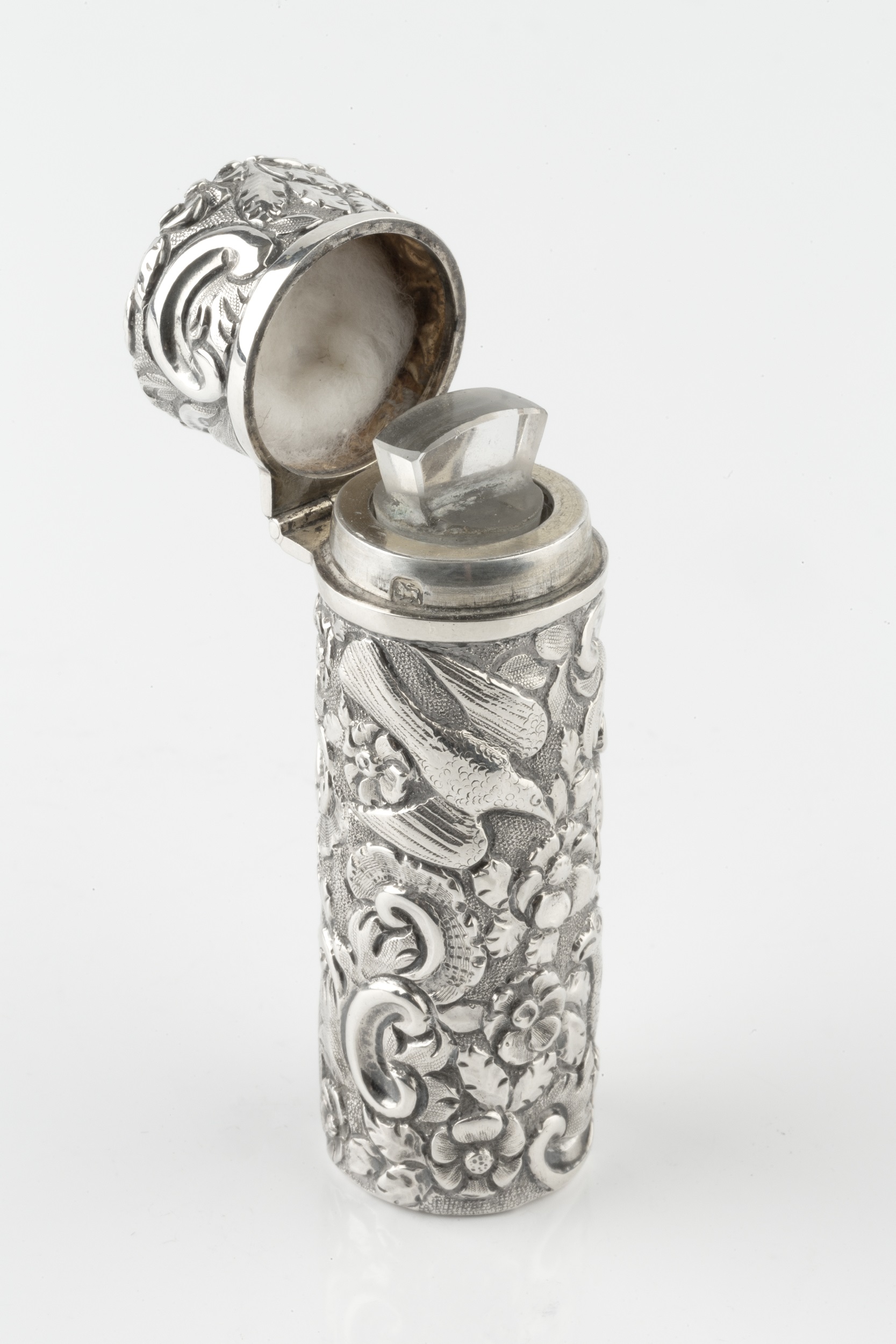 A late Victorian silver scent bottle of cylindrical form, embossed and engraved with exotic birds - Image 4 of 4