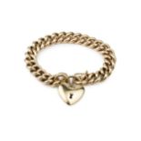 A 9k gold curb link bracelet, with heart shaped padlock clasp, the links stamped 9k, the clasp