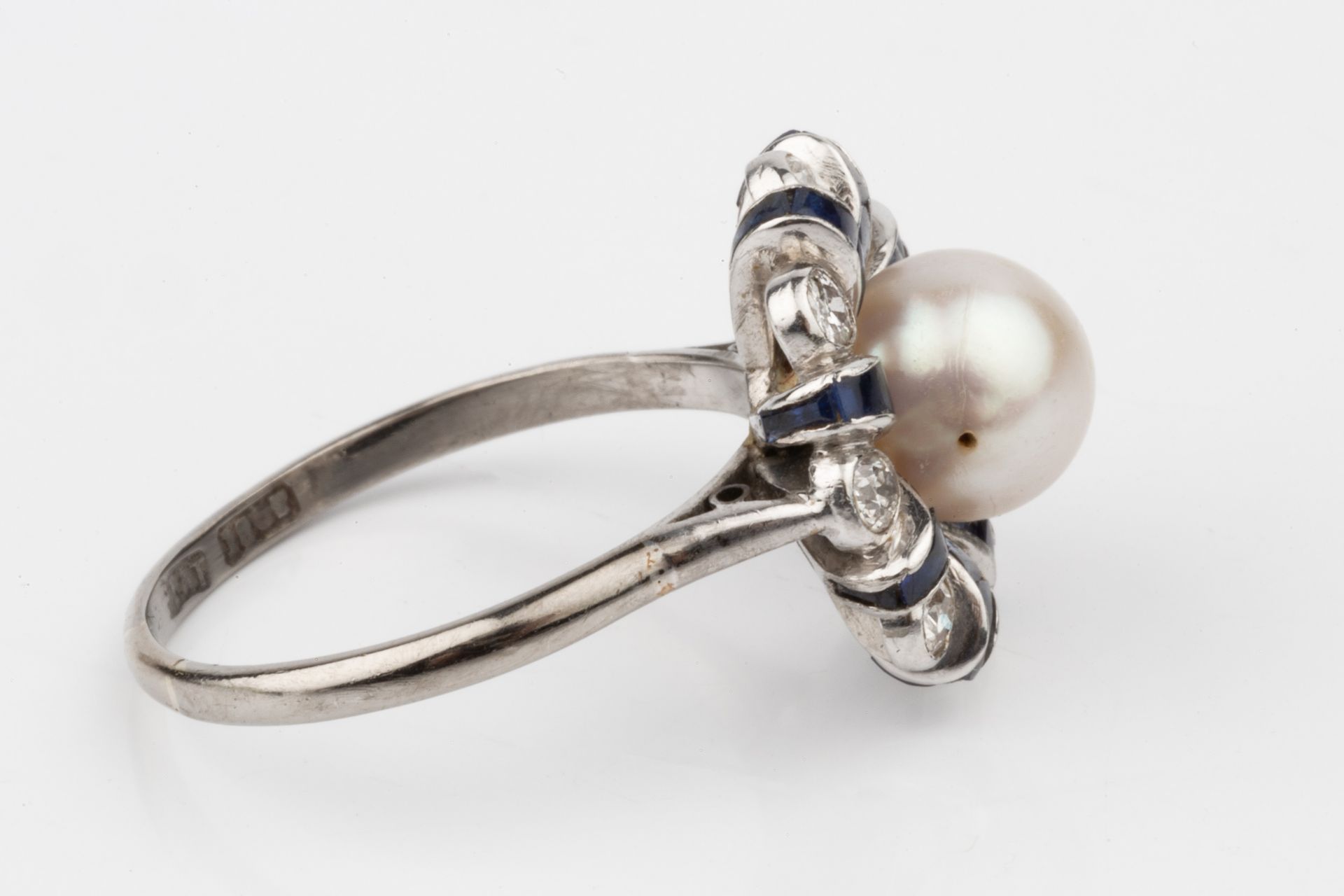 A diamond, sapphire and cultured pearl dress ring, the central pearl (untested) set within a - Image 4 of 4
