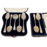 Four George III silver old English pattern tablespoons, and a similar sifter spoon, all later