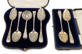 Four George III silver old English pattern tablespoons, and a similar sifter spoon, all later