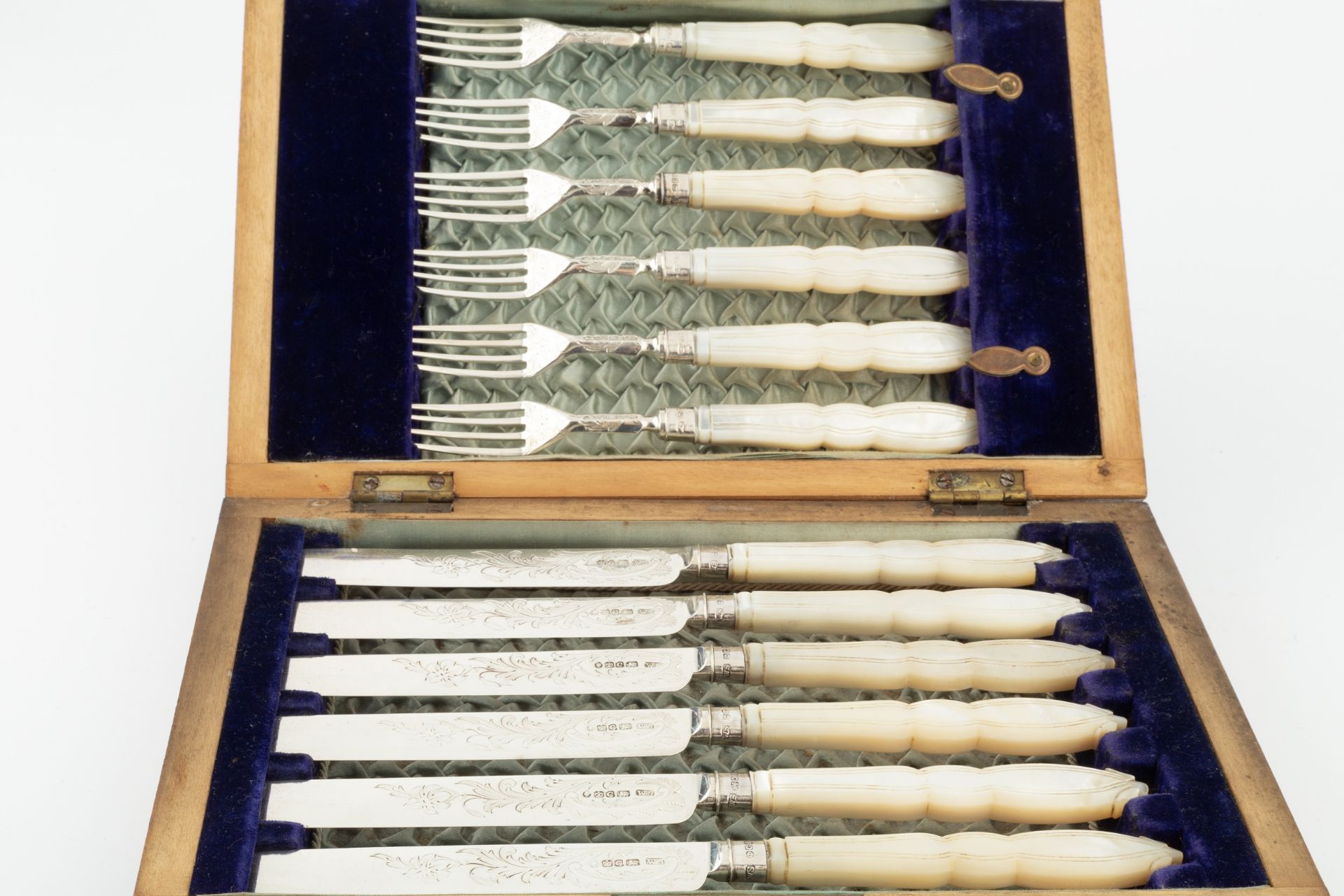 A set of six Early Victorian silver dessert knives and forks, with foliate engraved decoration and - Image 2 of 2