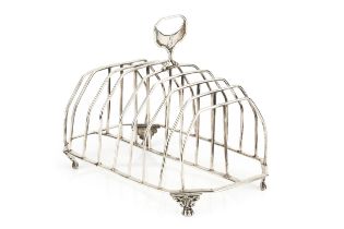 A George III silver nine bar toast rack, the angular wirework divisions with central handle, on