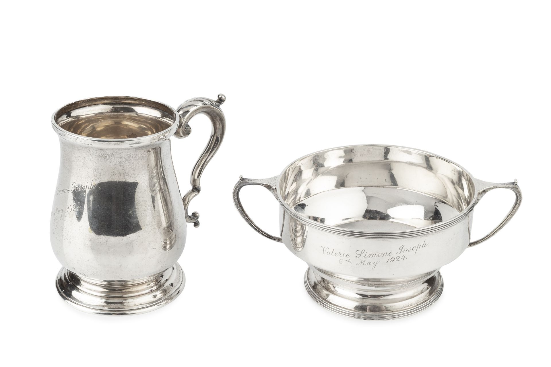 A George V silver baluster mug, with leaf capped scroll handle, by Atkin Bros, Sheffield 1924, 10.