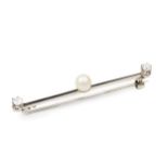 A diamond and cultured pearl bar brooch, the knife edge bar centred with a pearl (untested), and