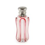 A Victorian silver mounted glass scent bottle, of waisted and faceted form with red overlaid line