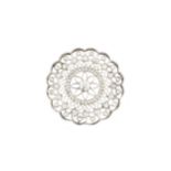 A diamond panel brooch, the circular openwork panel centred with an old brilliant-cut diamond in