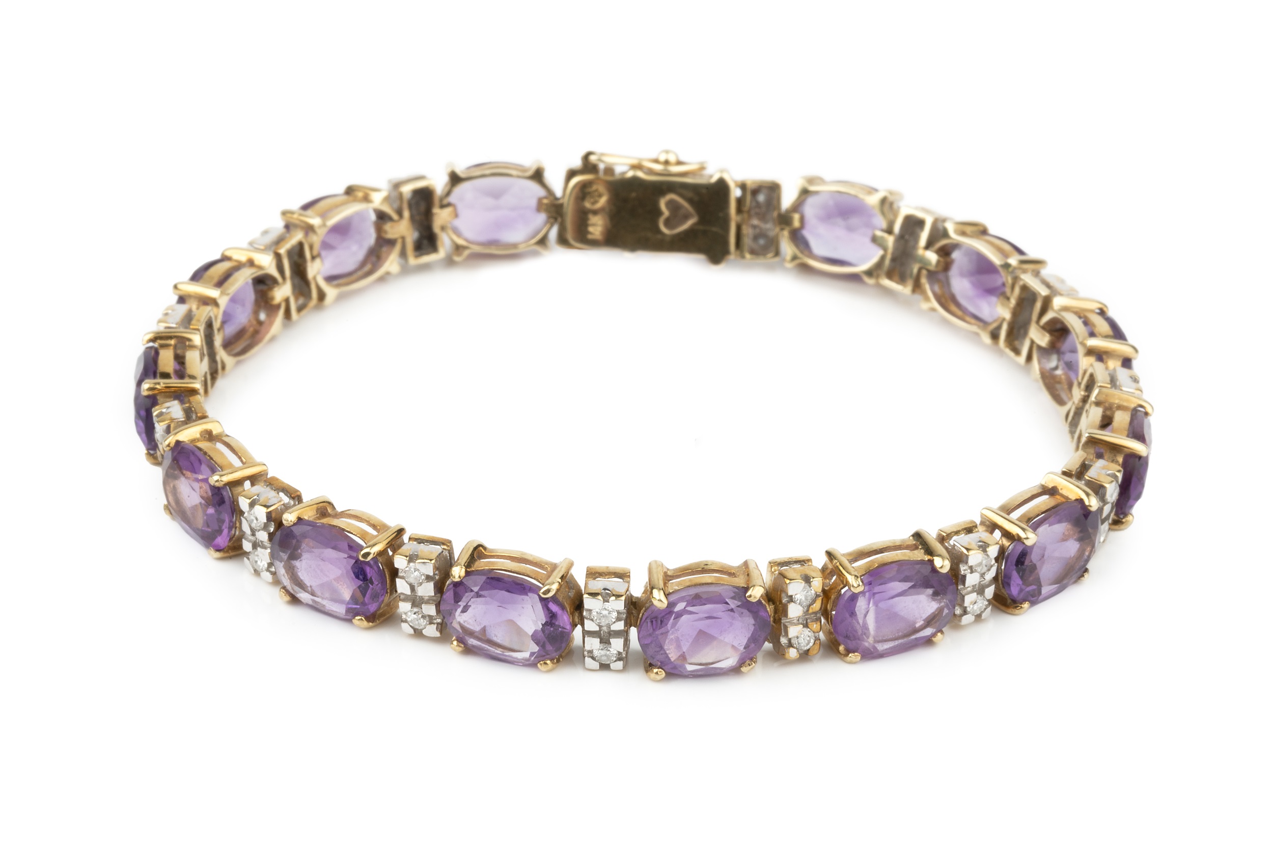 An amethyst and diamond bracelet, set with oval cut amethysts and having spacer bars between set