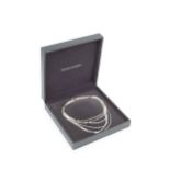 An 'Aria' sterling silver necklet by Georg Jensen, featuring six rows of bar-link chain, with a