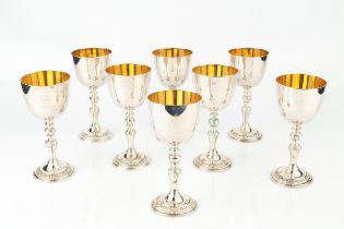 A set of eight silver limited edition commemorative goblets, for the silver wedding of Queen