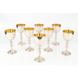 A set of eight silver limited edition commemorative goblets, for the silver wedding of Queen