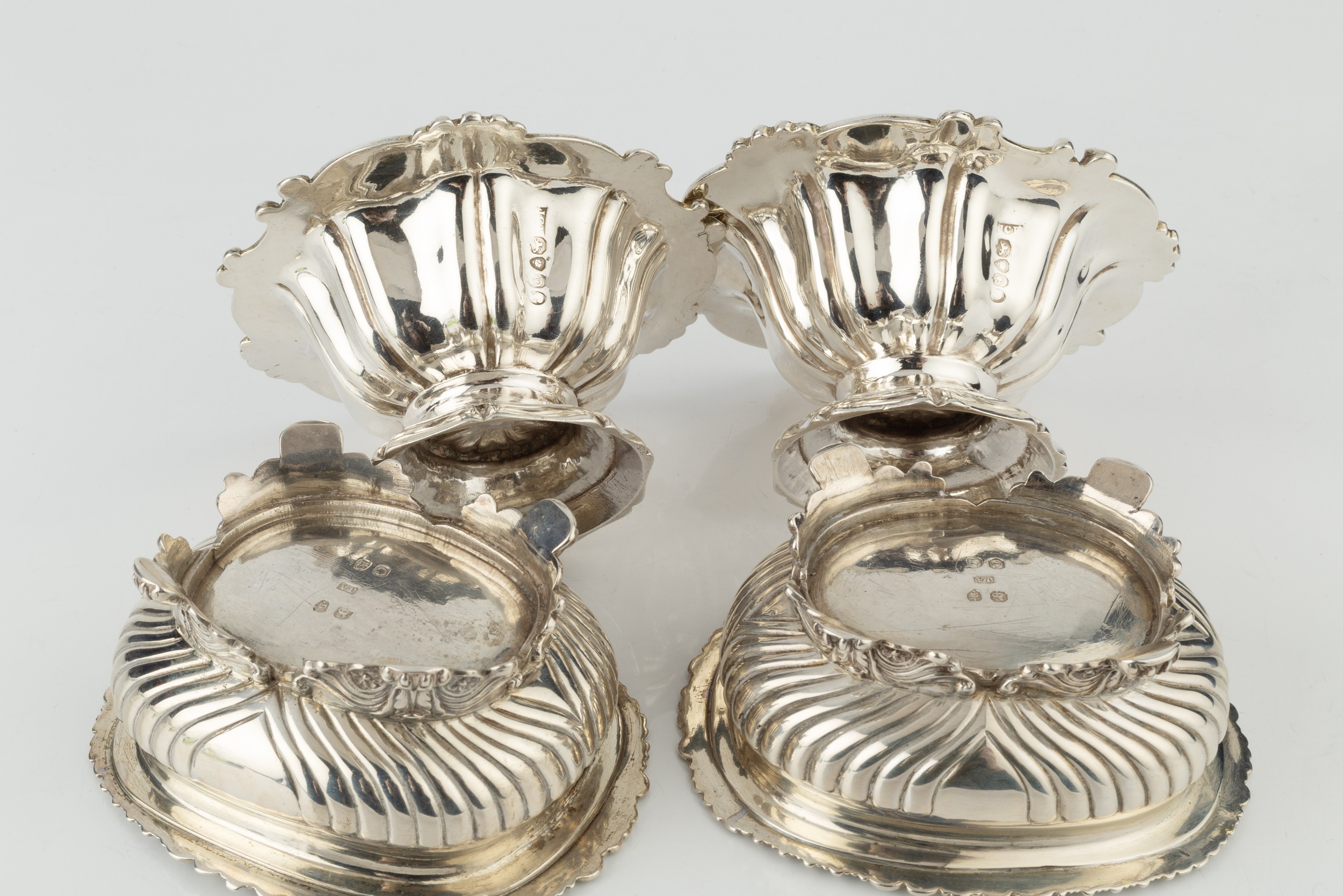 A pair of George III silver salts, with gadrooned and scalloped borders, lobed decoration and - Image 2 of 2