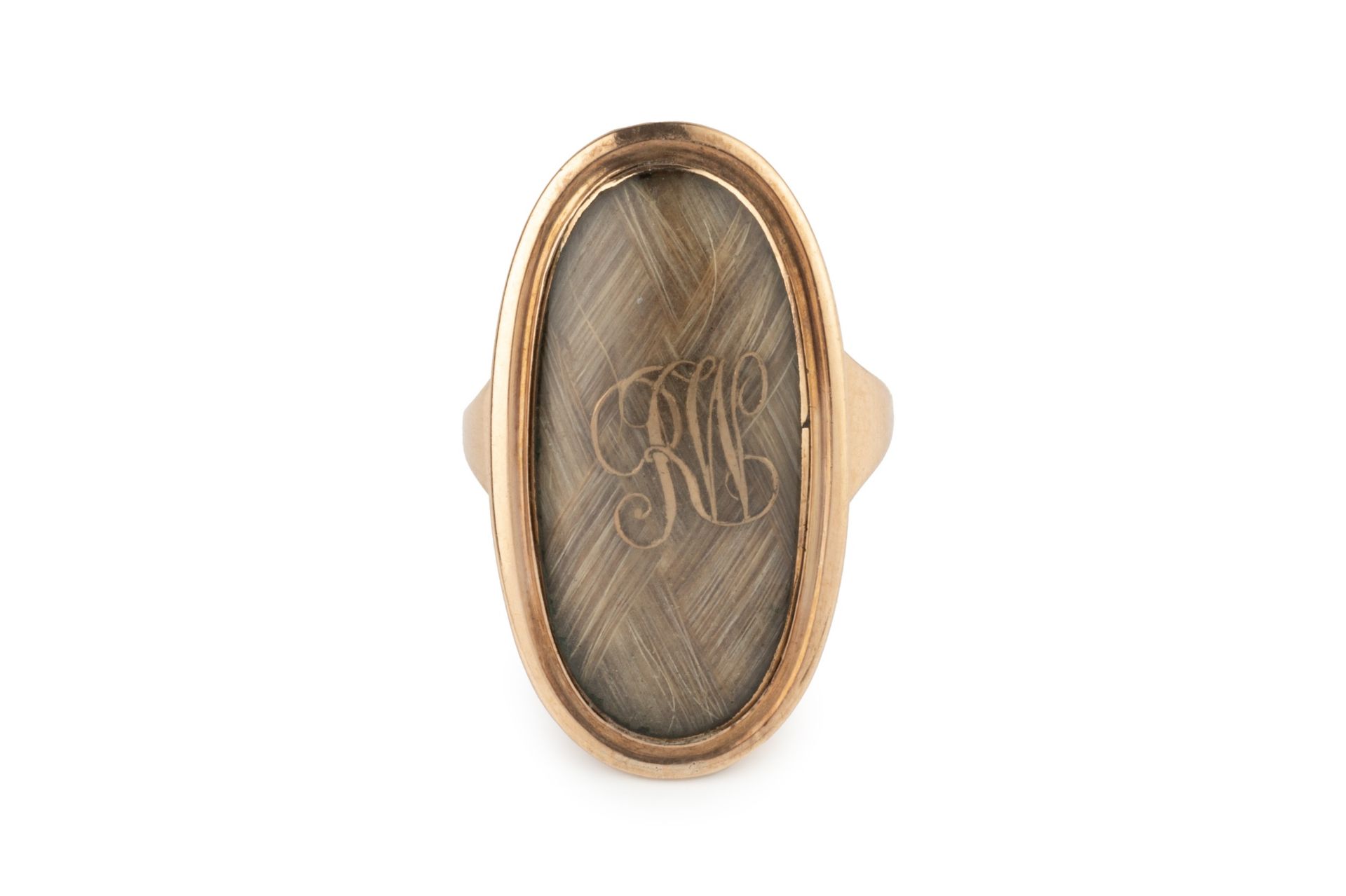 A George III gold oval memorial ring, the glazed hairwork panel with gilt monogram RW, inscribed