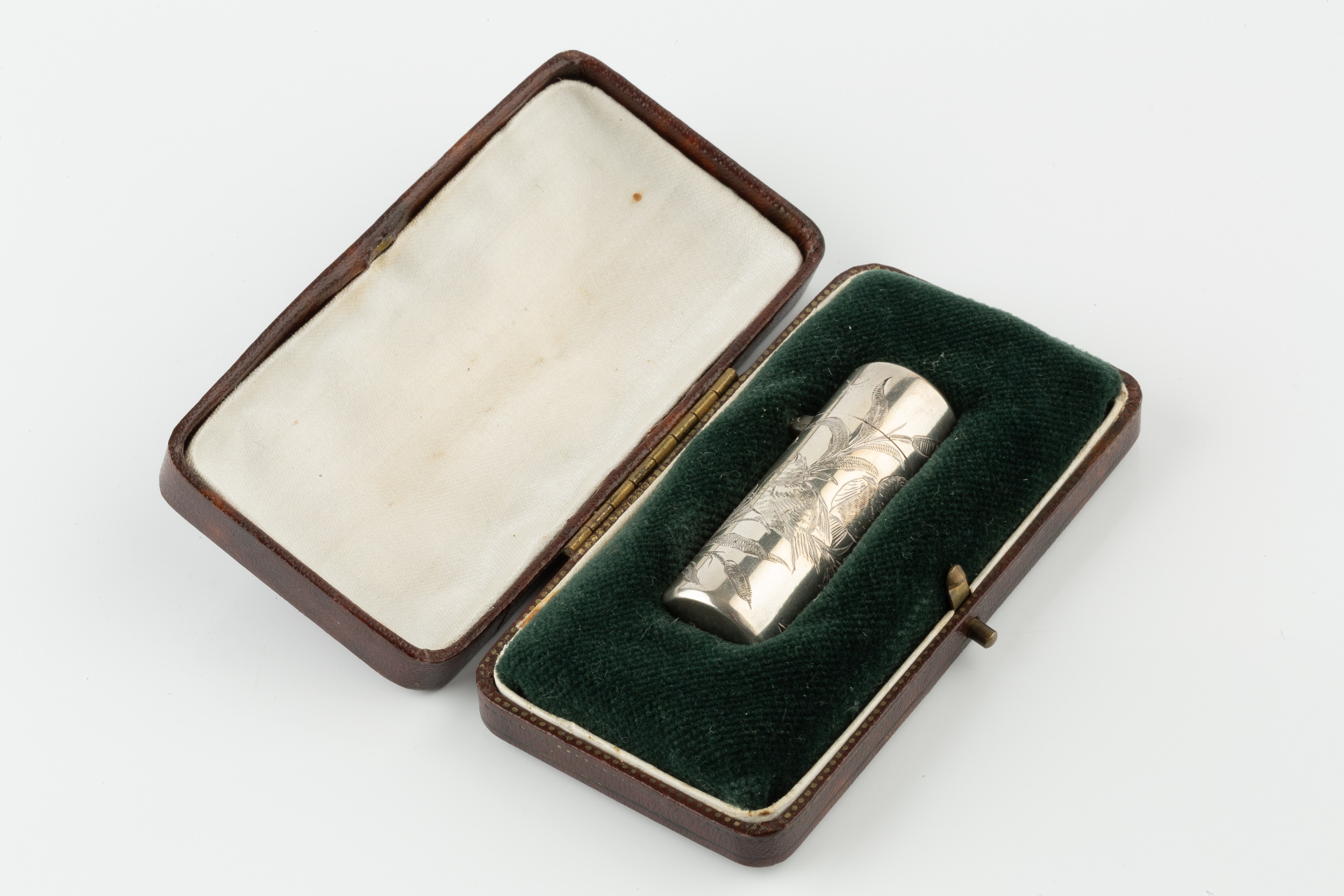 A late Victorian silver cylindrical scent bottle, engraved with songbirds amidst foliage, the hinged - Image 2 of 4