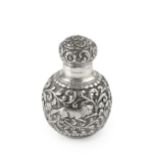 A late 19th century Anglo-Indian silver scent bottle, of globular form, embossed and engraved with a