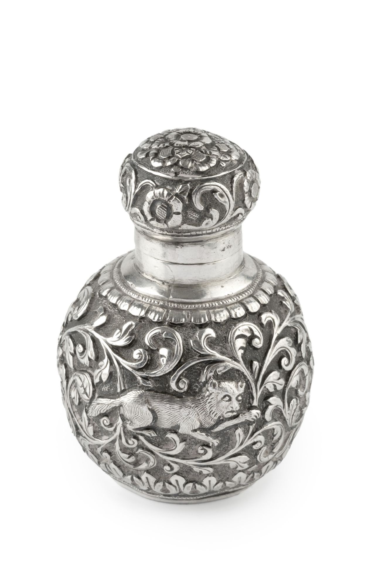 A late 19th century Anglo-Indian silver scent bottle, of globular form, embossed and engraved with a